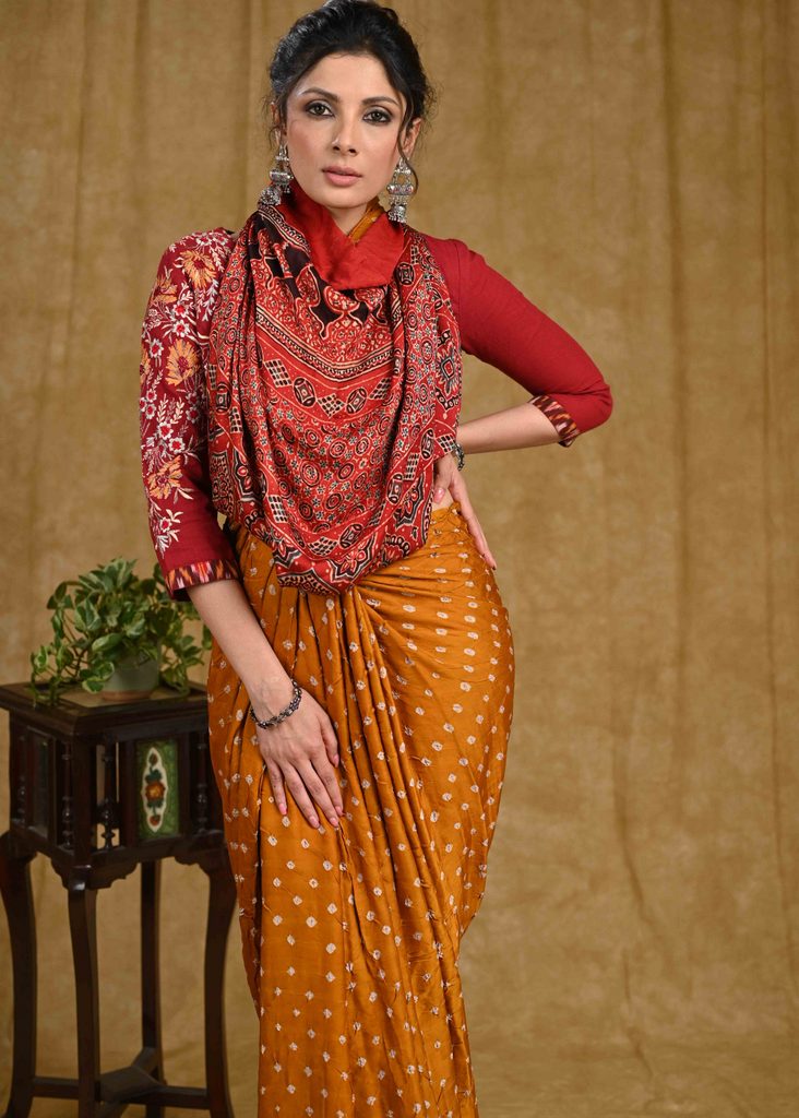 Exclusive modal silk Bandhej saree with Ajrakh block printed border & pallu