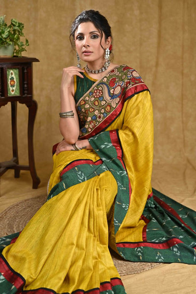 Stunning yellow Ghicha silk saree with Madhubani pallu and green Ikaat border