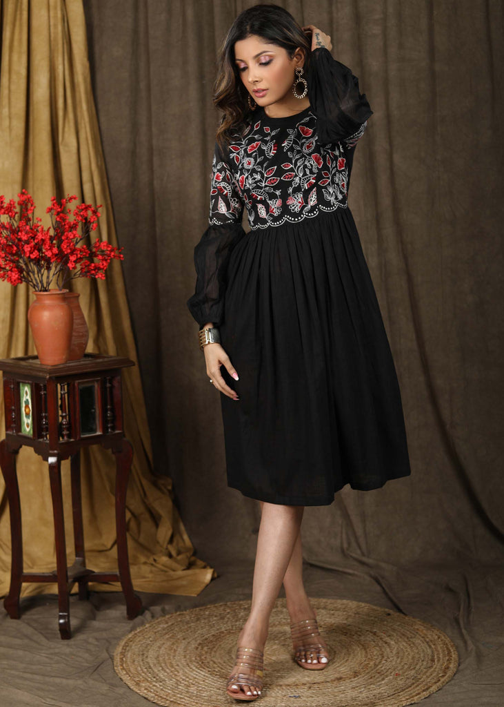 Trendy black cotton gathered dress with beautiful zari embroidery combined with chanderi sleeves