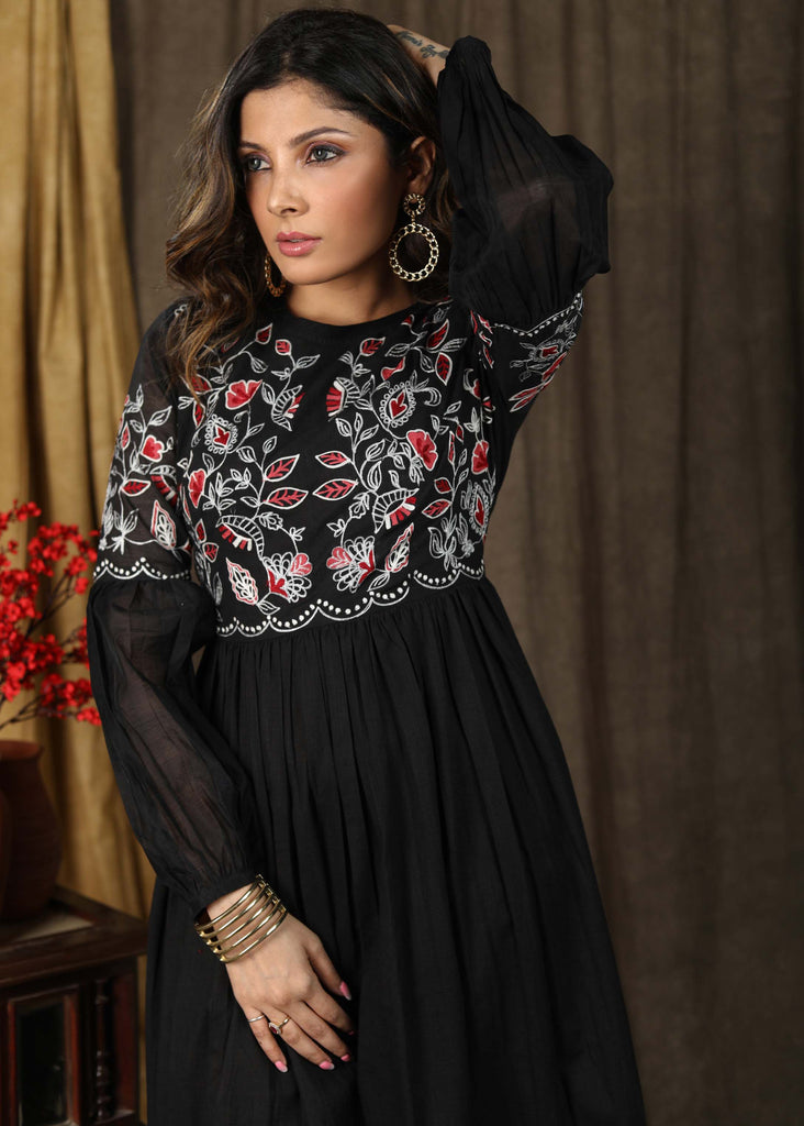 Trendy black cotton gathered dress with beautiful zari embroidery combined with chanderi sleeves