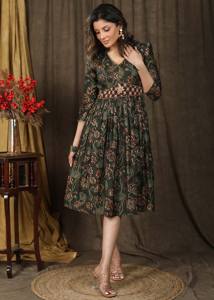 Elegant olive green foiled floral A-line gathered dress with beautiful hand embroidered attached belt