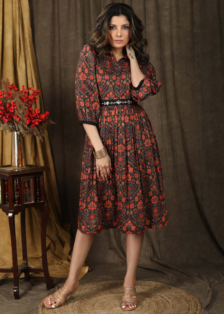 Elegant black muslin floral print gathered dress with attached stonework belt