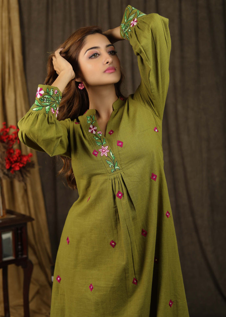 Exclusive henna green tunic dress with minimal floral embroidery on sleeves and neckline