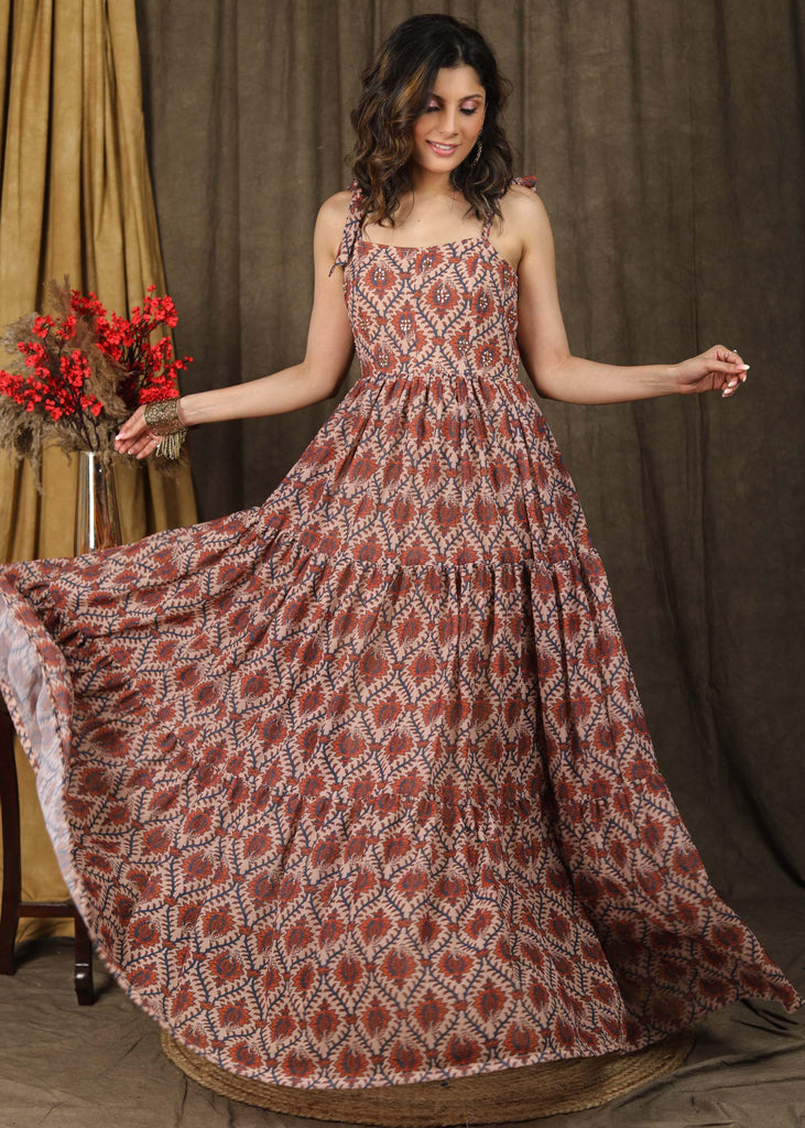 Exclusive boroque print peach maxi dress highlighted with stone embellishments and optional chanderi shrug
