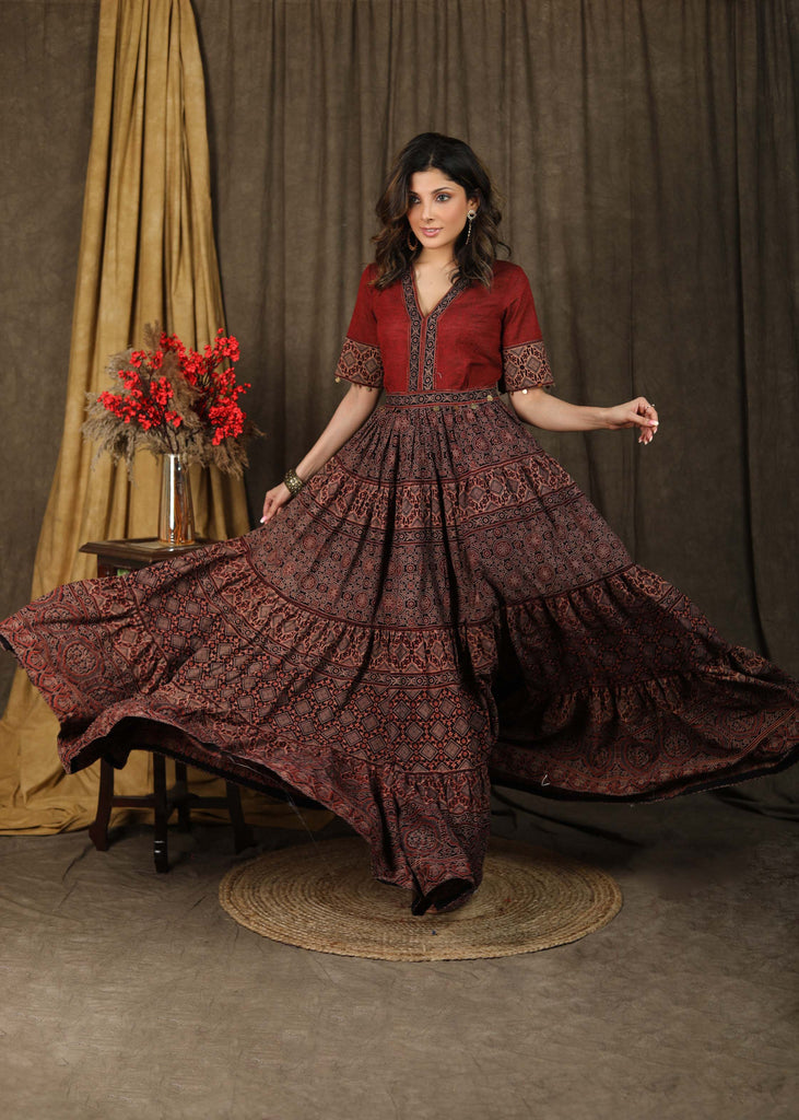 Elegant Ajrakh combination Kalidaar Gown with elbow sleeves highlighted with coin embellishments