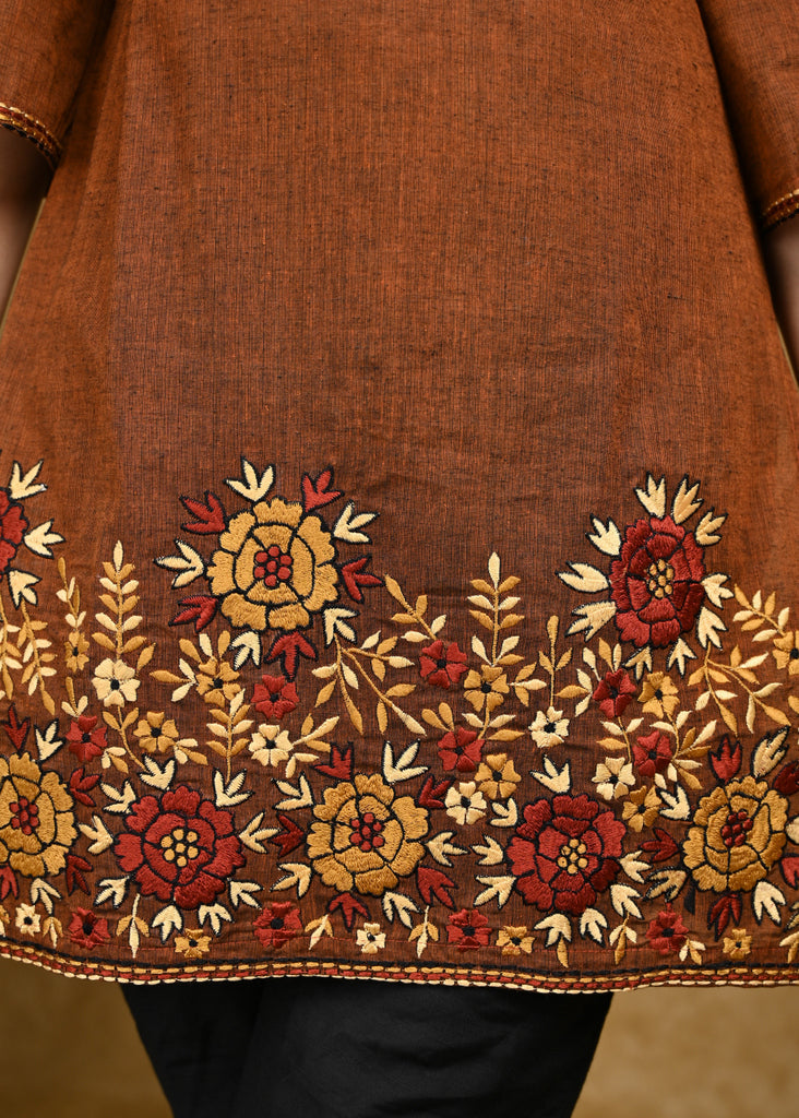 Elegant Handloom Cotton Tunic with Detailed Floral Embroidery on Hemline