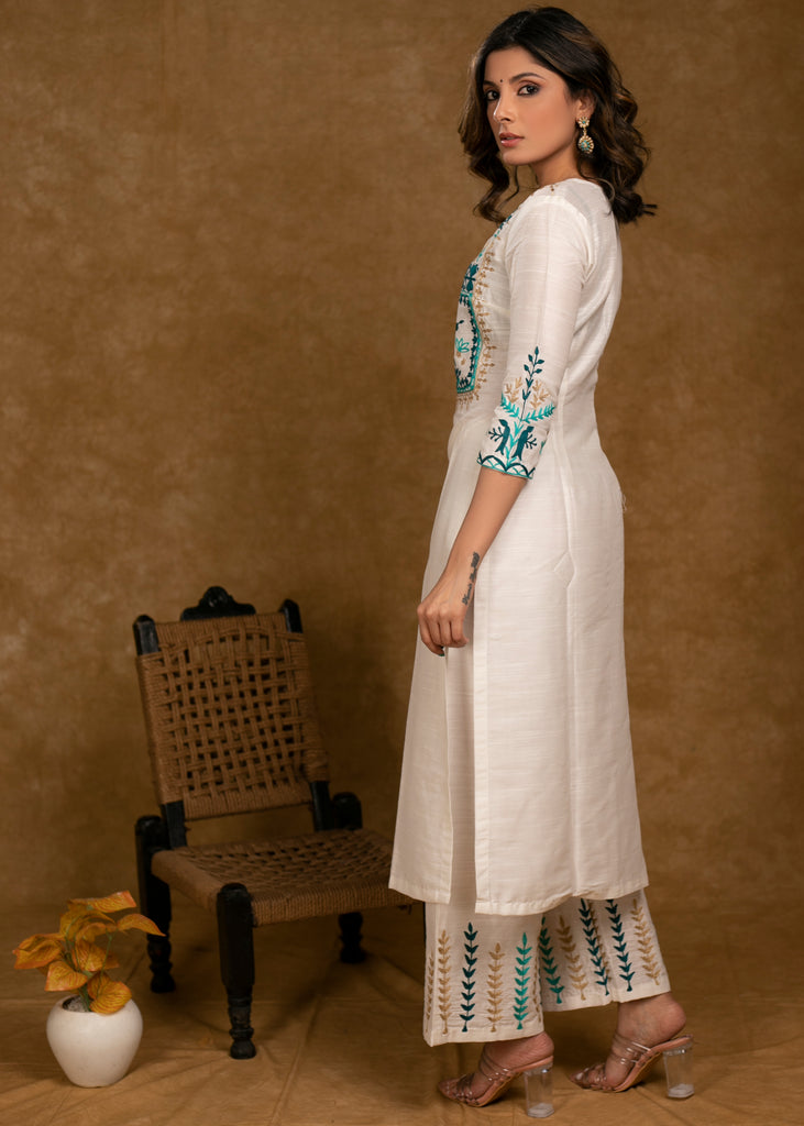 Graceful Off-White Cotton Silk Kurta & Pant Set with Intricately Embroidered Yoke