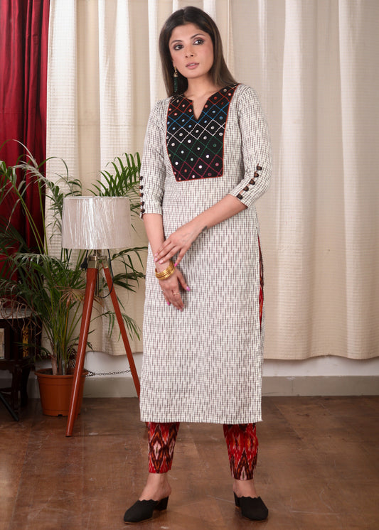 Graceful Straight Cut Ikat Kurta with Hand Embroidered Mirror Work On the Yoke and Beaded Sleeves