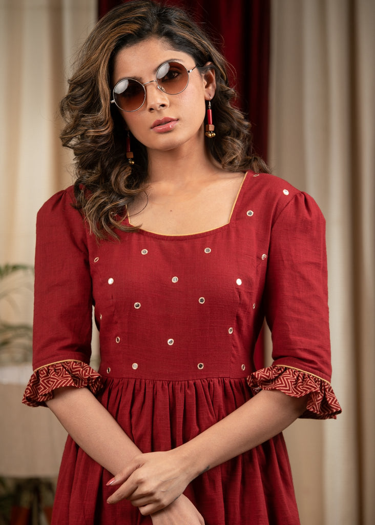 Rust cotton tiered dress with mirror work