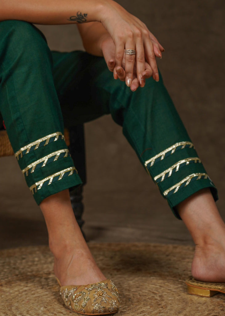 Smart bottle green rayon narrow fitted pant with beautiful lace on hem