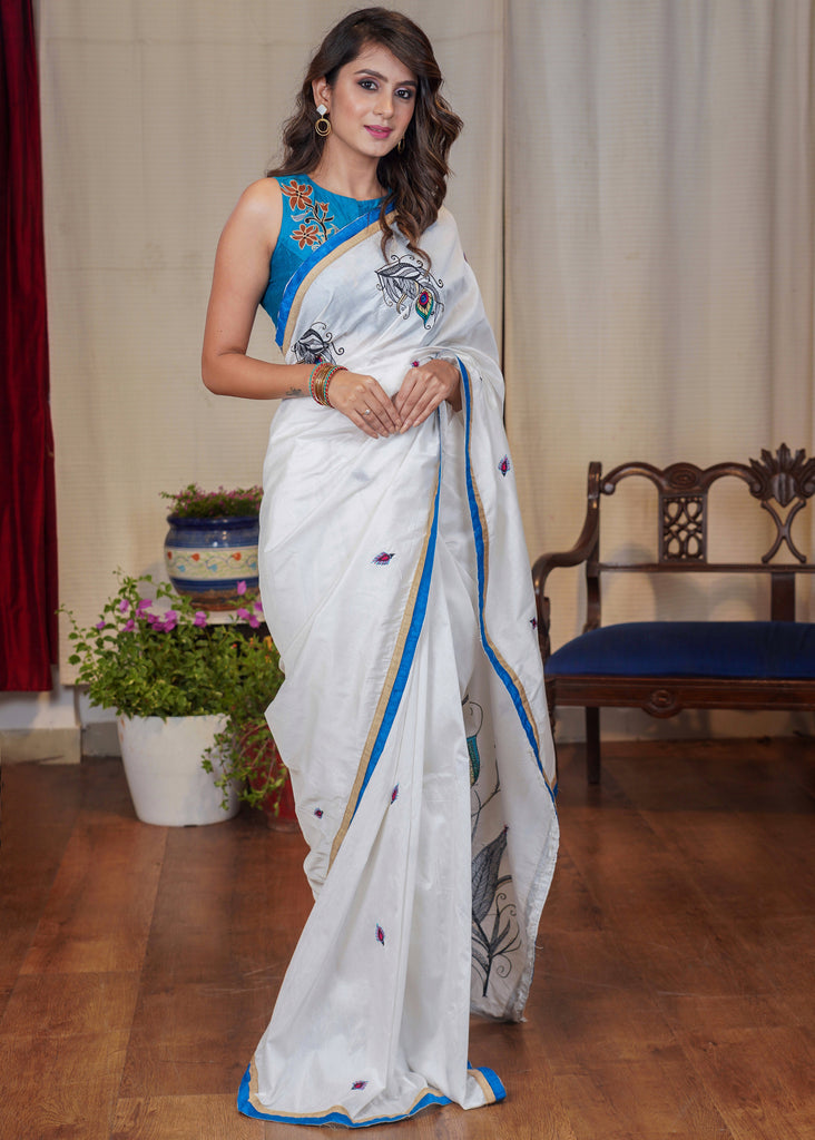 White cotton saree with beautiful peacock feather motif