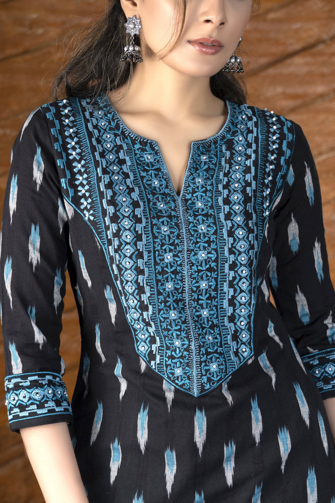 Exclusive black ikat kurta with embroidered yoke.
