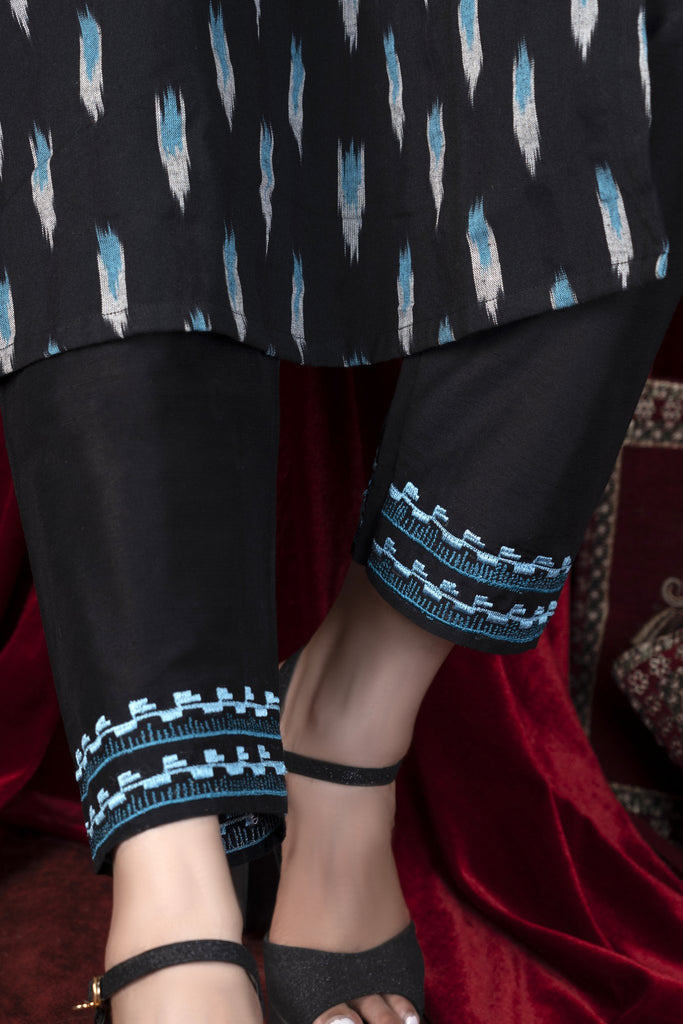 Exclusive black ikat kurta with embroidered yoke.