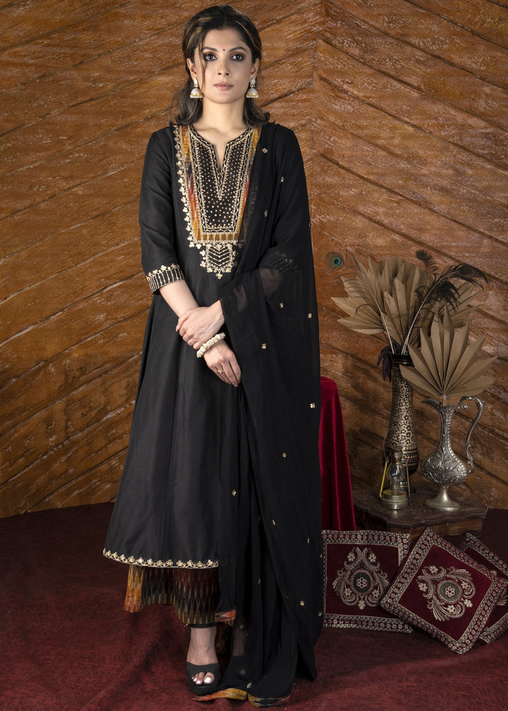 Plain black cotton silk kurta with heavy hand embroidered yoke & ikat palazzo pants - Dupatta optional.