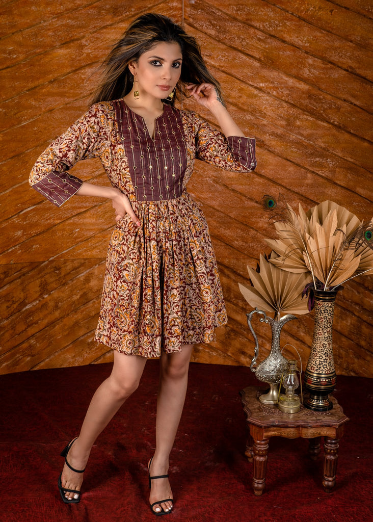 Exclusive Kalamkari short dress with hand embroidered yoke.