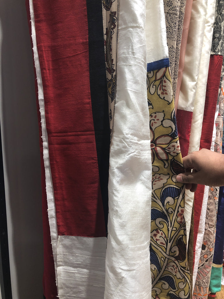 Exclusive pure raw silk saree with Handpainted kalamkari pallu and border