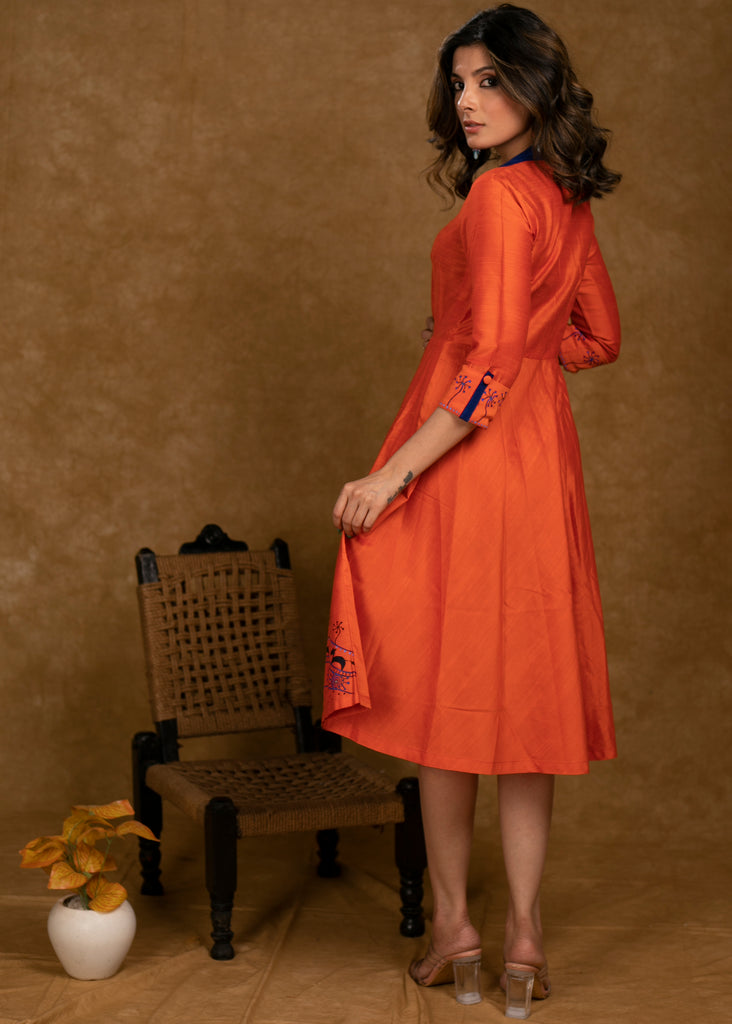 Exclusive Orange Cotton Silk Dress with Gond Painting on Hemline and Sleeves