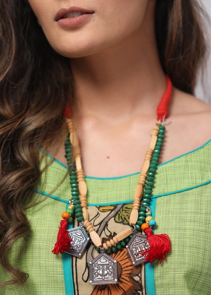 Forest green & off white beads necklace with tassels & german silver pendant