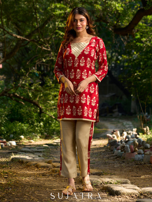 Vibrant red viscose short kurta showcasing a charming floral print, refined pintuck neck panel
