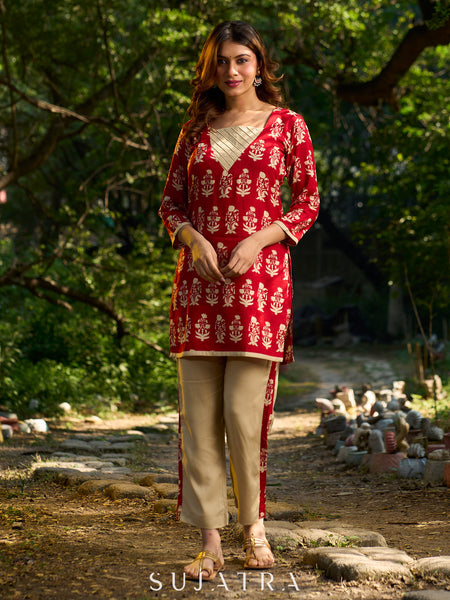 Vibrant red viscose short kurta showcasing a charming floral print, refined pintuck neck panel