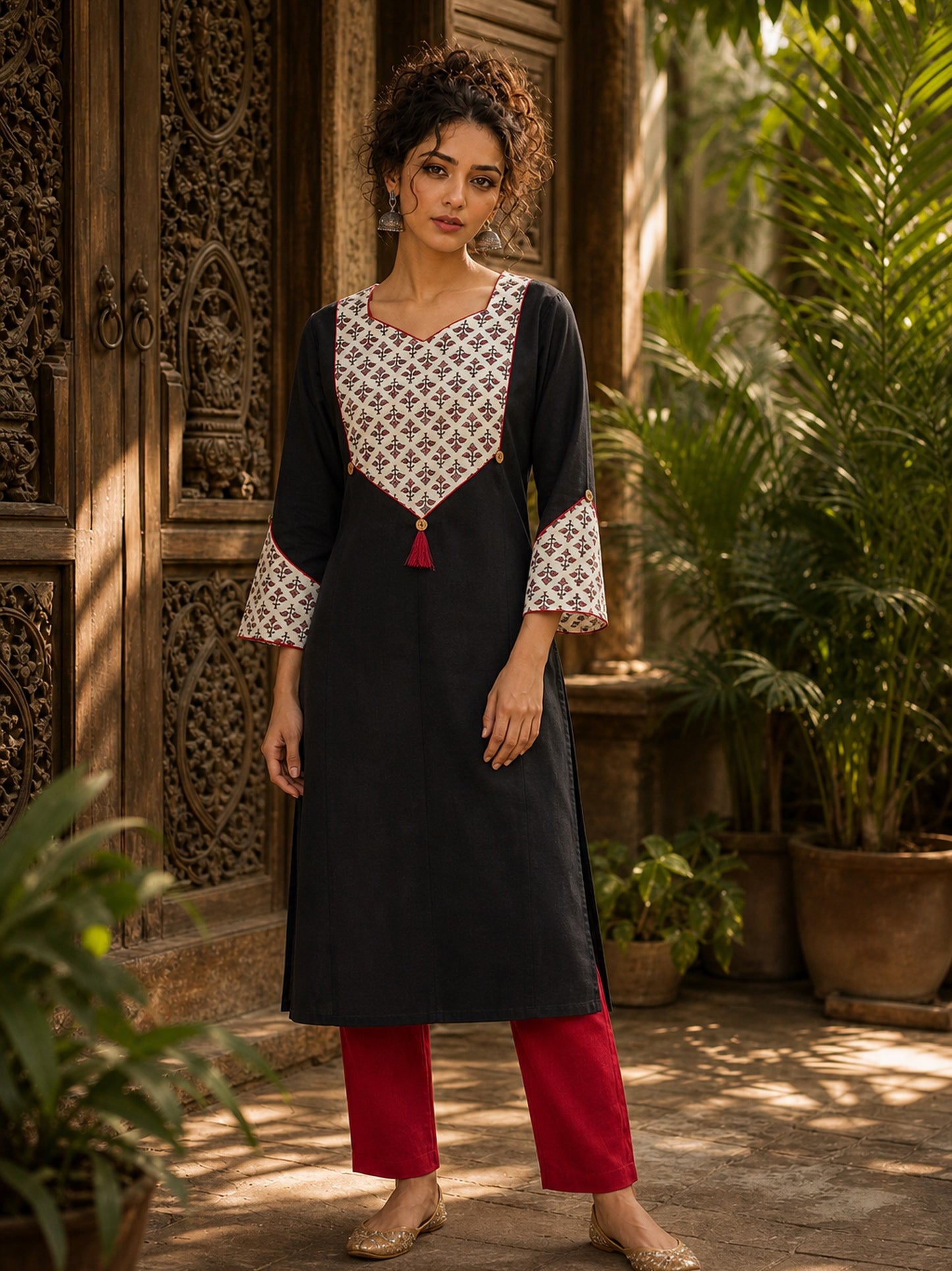 Black Cotton Kurta with Ajrakh Printed Yoke & Matching Cuffs with Minimal Embellishment