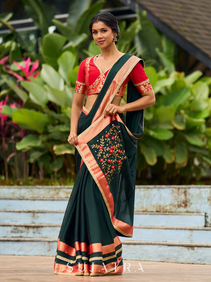 Timeless Bottle Green Georgette Saree with Contrast Red Benarasi Border & Hand Embroidered Pallu