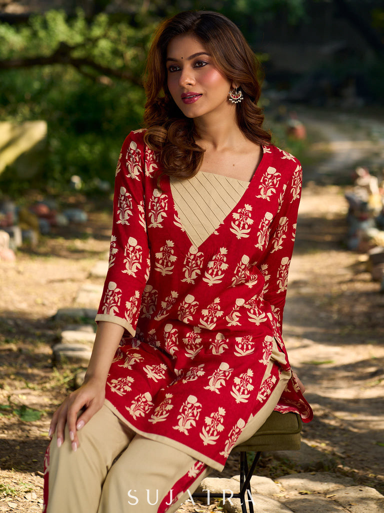 Vibrant red viscose short kurta showcasing a charming floral print, refined pintuck neck panel