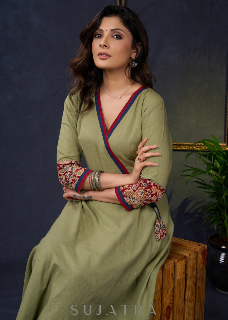 Exclusive-Sage-Green-Cotton-A-Line-Kurta-With-Kalamkari-Combination-Pant-Optional