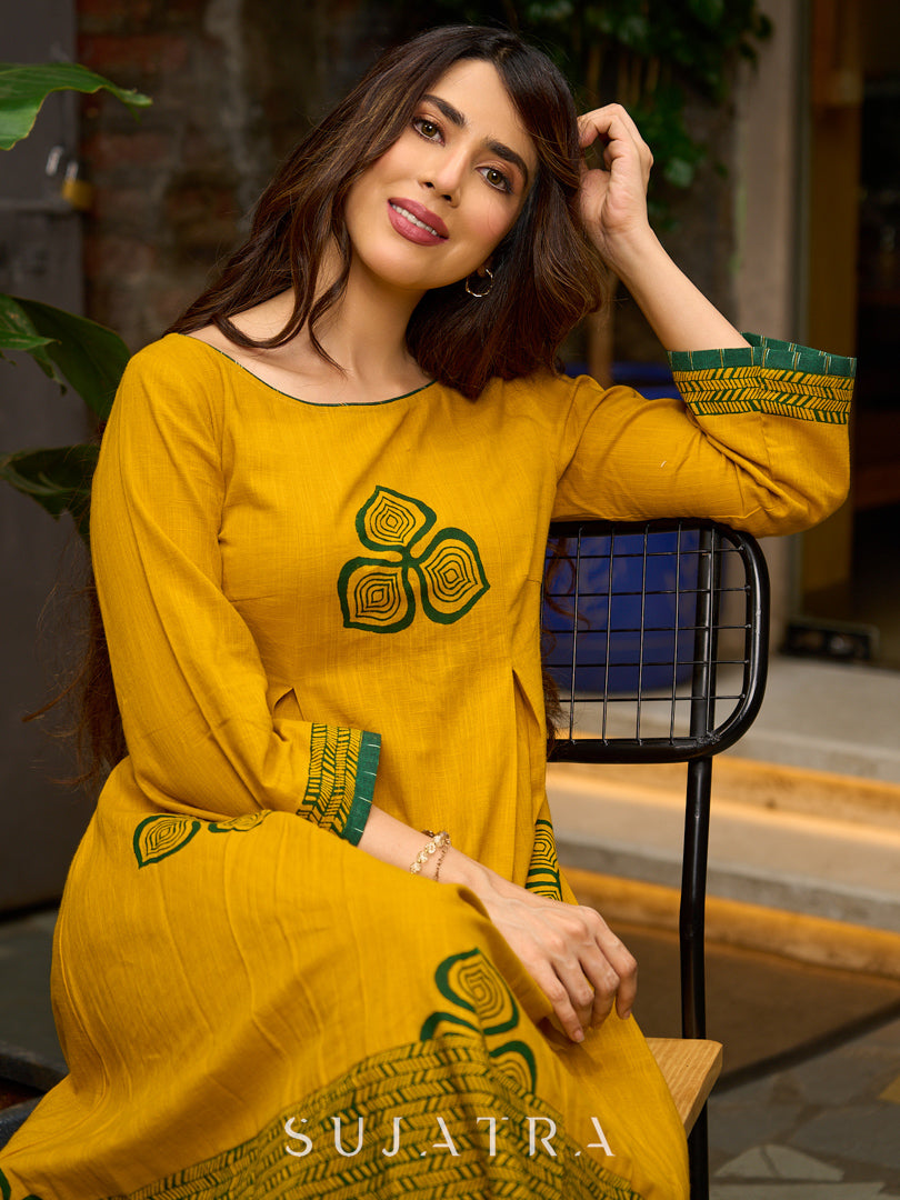 Contemporary Mustard Floral Hand Block Print Dress featuring Front & Back Box Pleat with Geometric Border on Hem & Sleeves