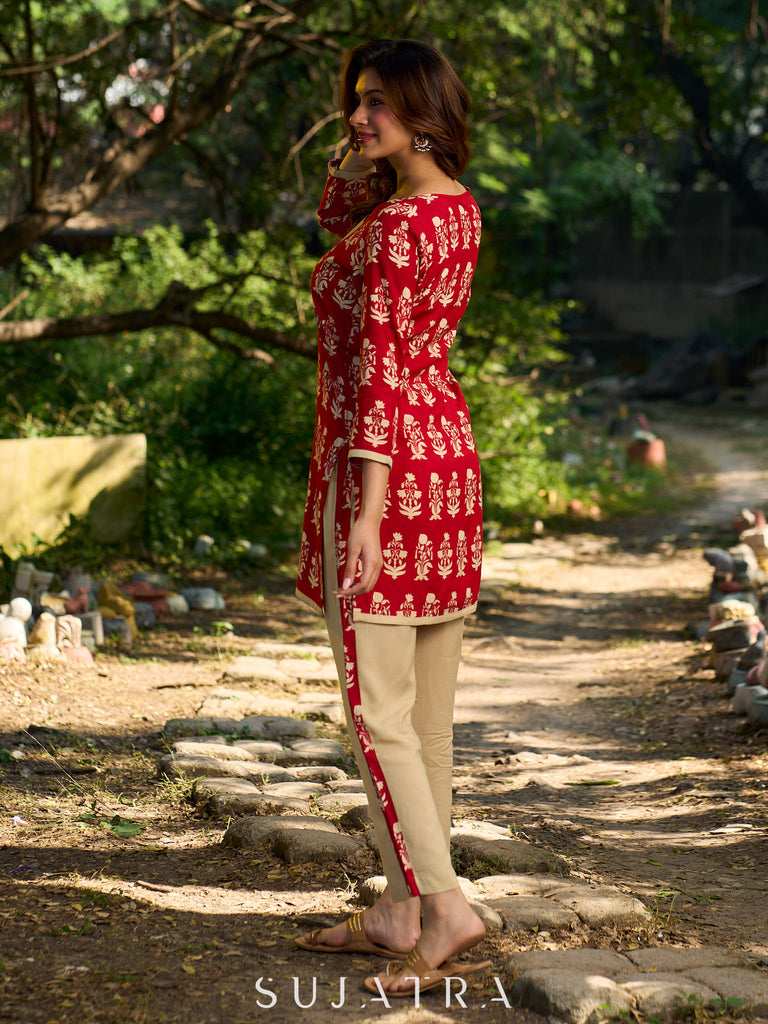 Vibrant red viscose short kurta showcasing a charming floral print, refined pintuck neck panel