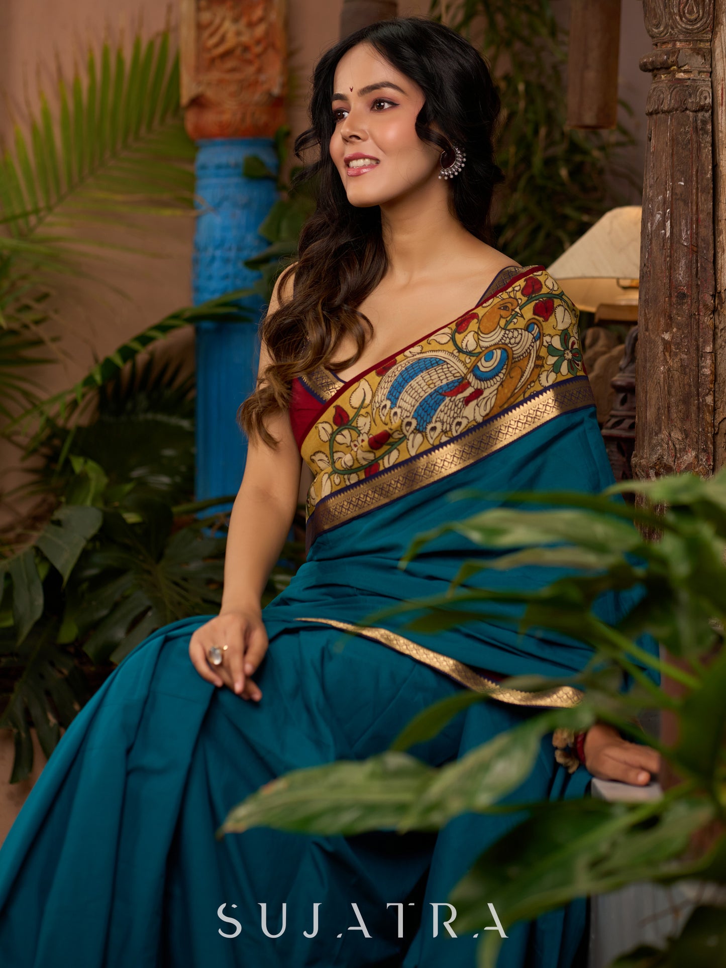 Teal cotton saree with Kalamkari border and rich khun border detailing