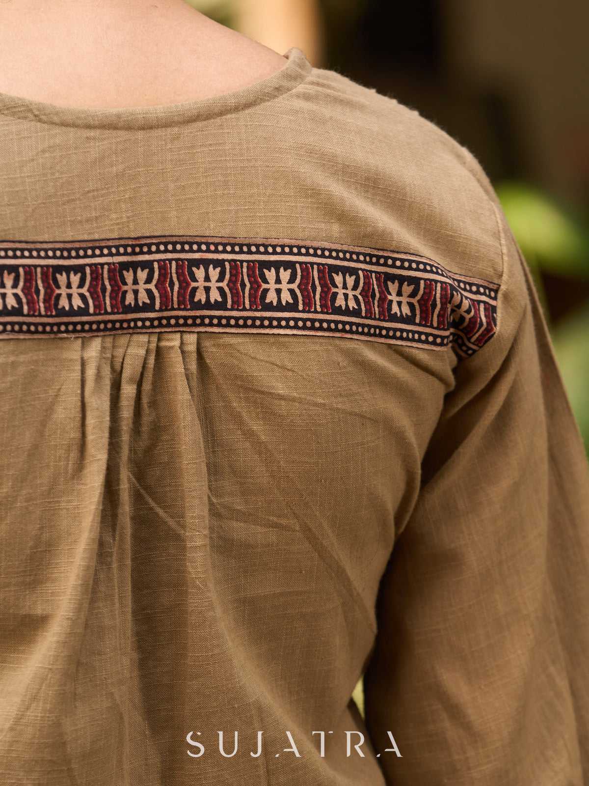 Beige Cotton Top Featuring Ajrakh Border, V Neckline, Gathered Sleeves And Fabric Tassels - Pant Optional