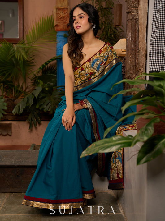 Teal cotton saree with Kalamkari border and rich khun border detailing