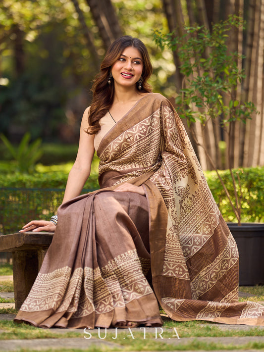 Exquisite Earthy Brown Tussar Silk Saree with Zari Border Detailing