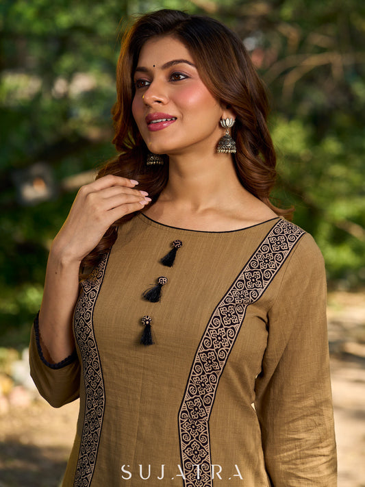 Minimal Sand Beige short kurta with a striking black Ajrakh border.