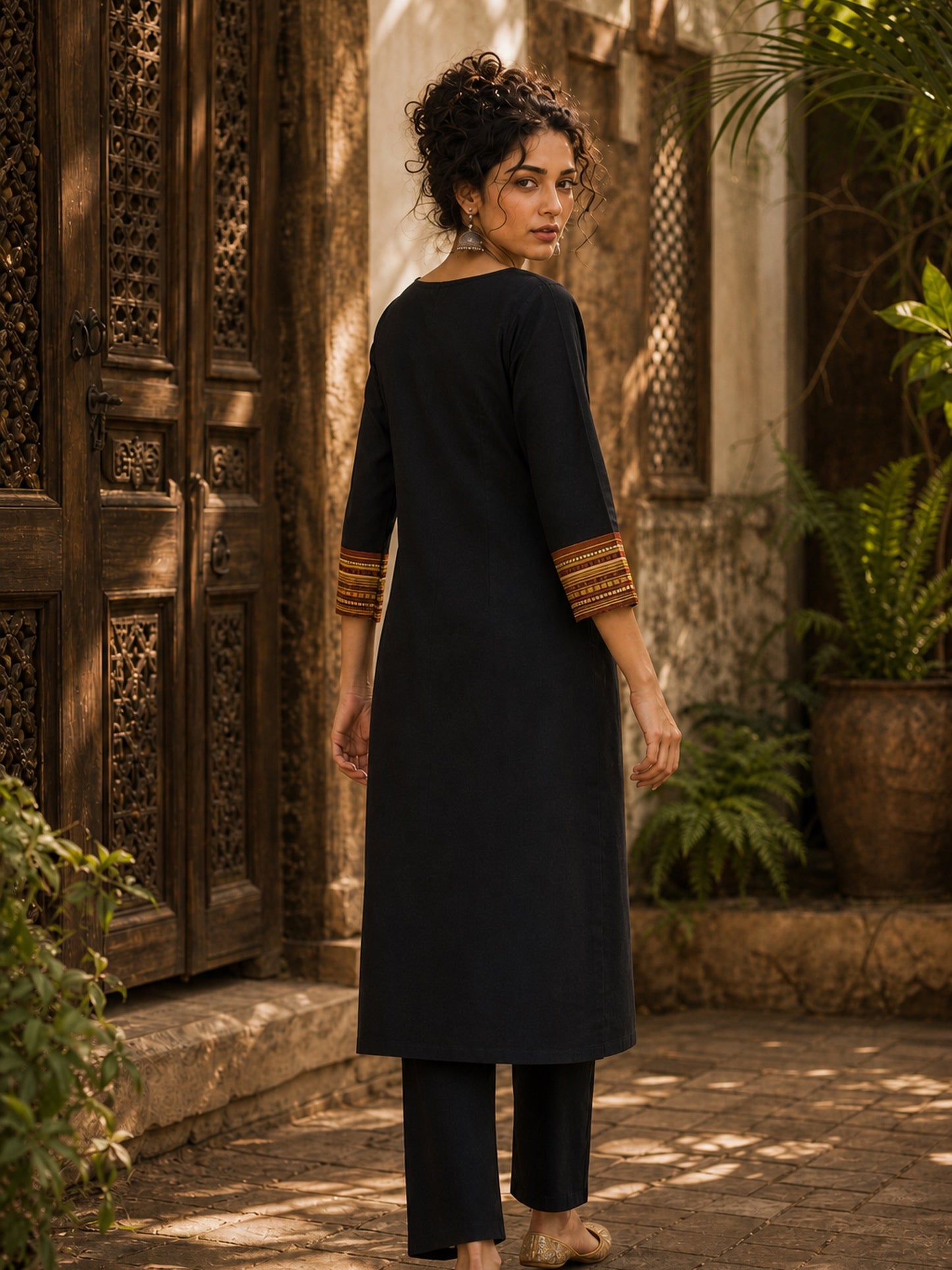 Timeless Black Cotton Kurta with Contrast Ajrakh Stripe Half Panel & Coordinated Sleeve Cuffs