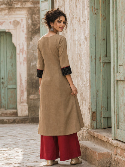 Striking Beige Cotton Kurta with Black Dotted Contrast Yoke & Embroidered Motif
