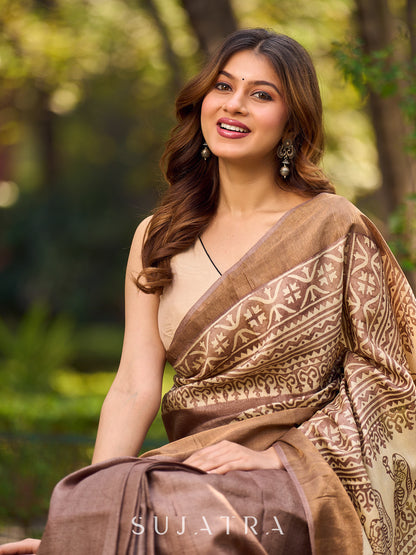 Exquisite Earthy Brown Tussar Silk Saree with Zari Border Detailing