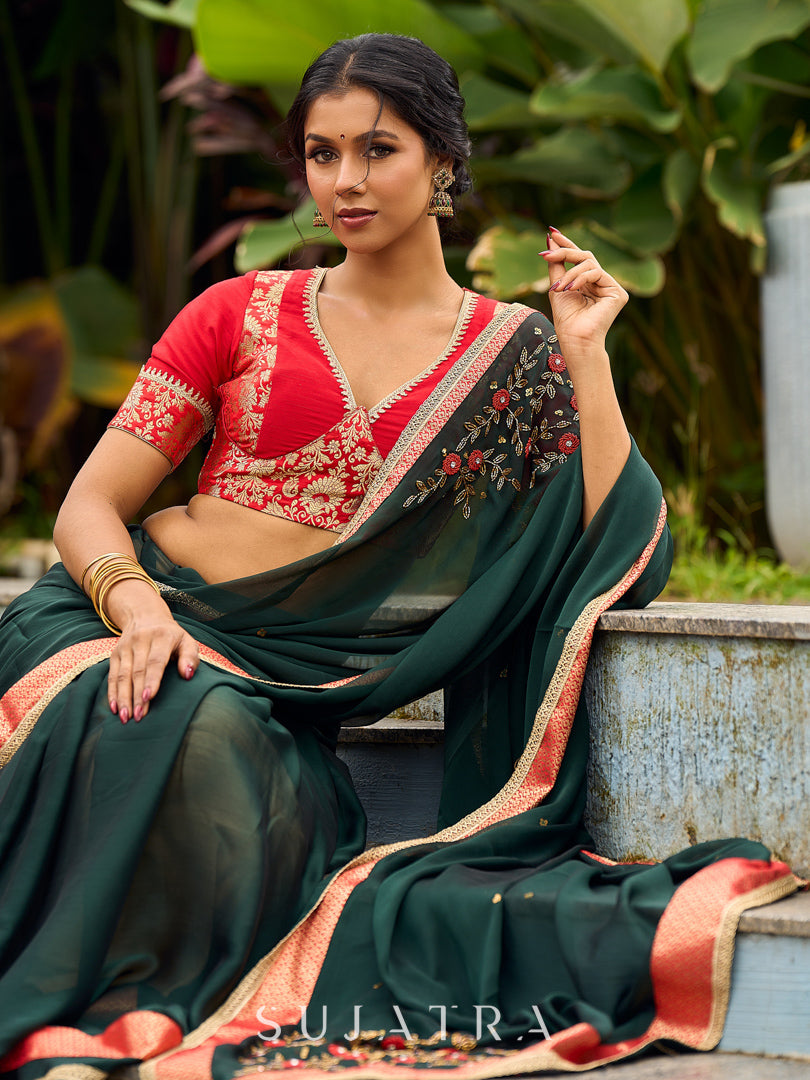 Timeless Bottle Green Georgette Saree with Contrast Red Benarasi Border & Hand Embroidered Pallu