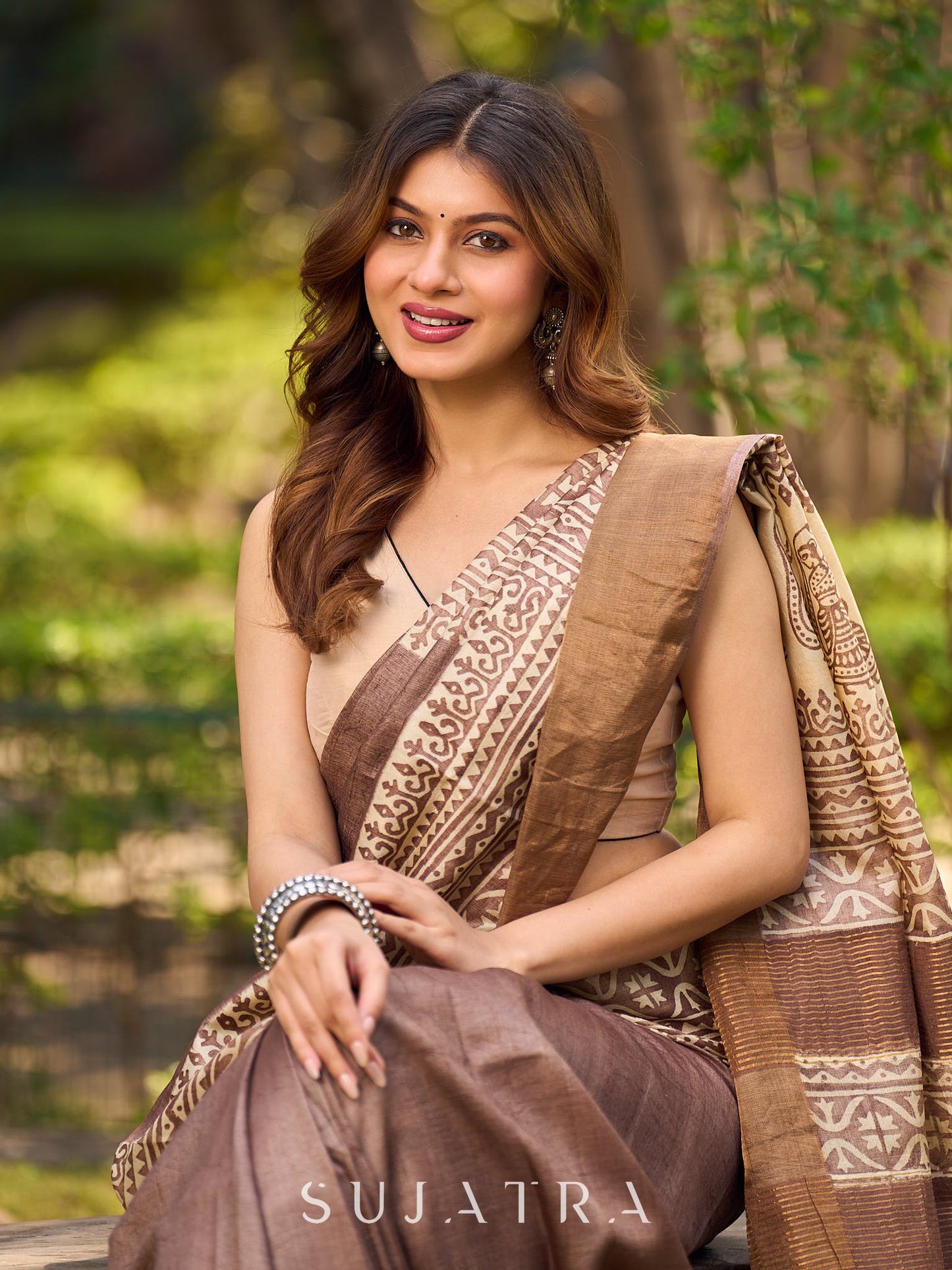 Exquisite Earthy Brown Tussar Silk Saree with Zari Border Detailing