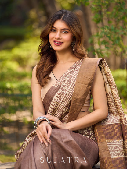 Exquisite Earthy Brown Tussar Silk Saree with Zari Border Detailing