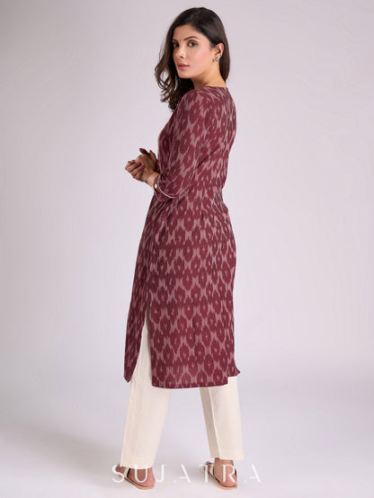 Sophisticated Maroon Ikat Cotton Kurta with Contrasting White Piping Accents