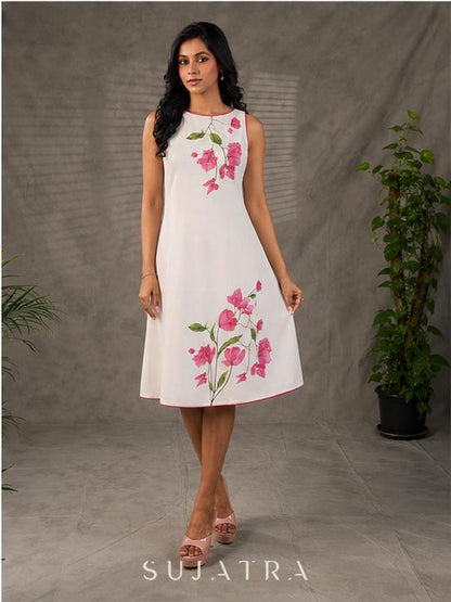 White and pink bougainvillea printed statement dress with pearl embellishments and pink accents