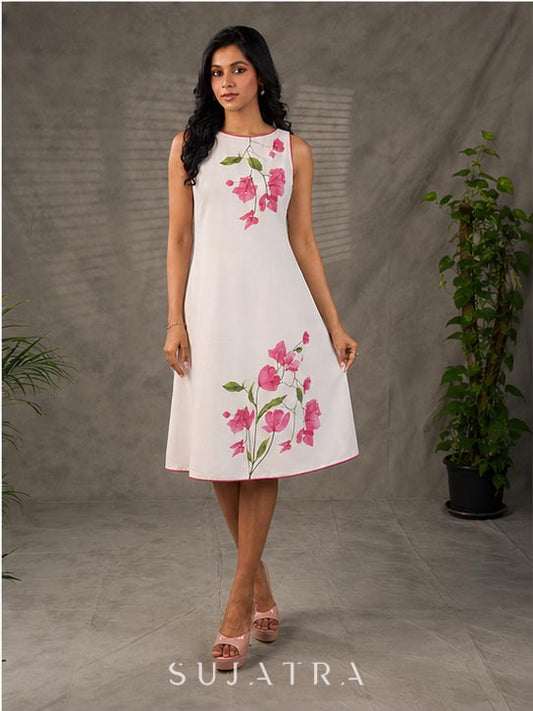 White and pink bougainvillea printed statement dress with pearl embellishments and pink accents