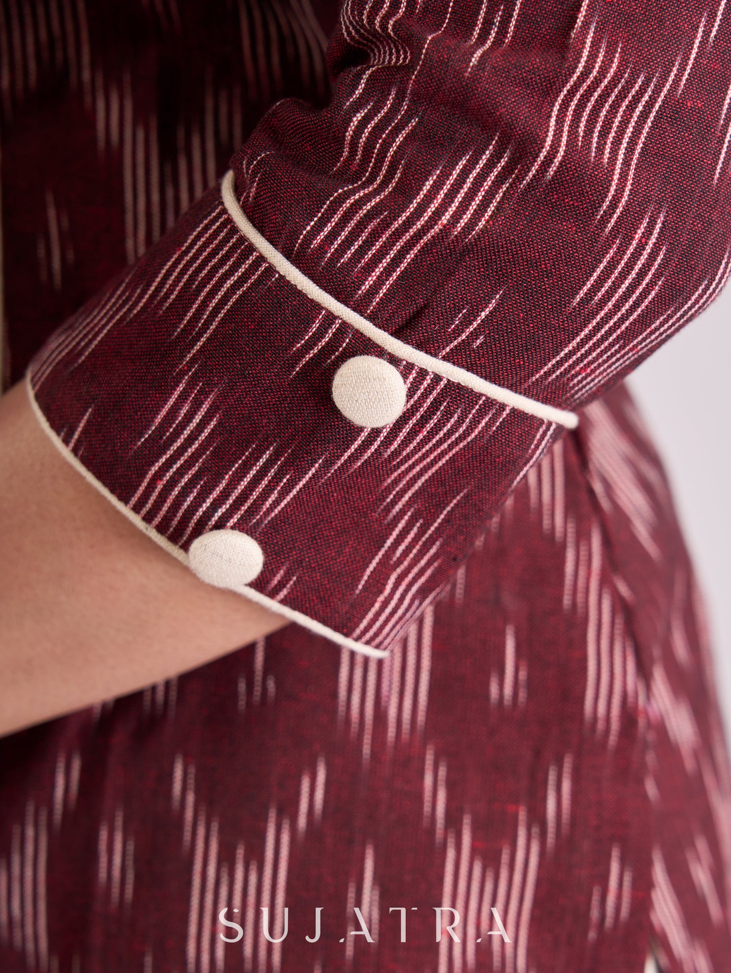 Sophisticated Maroon Ikat Cotton Kurta with Contrasting White Piping Accents