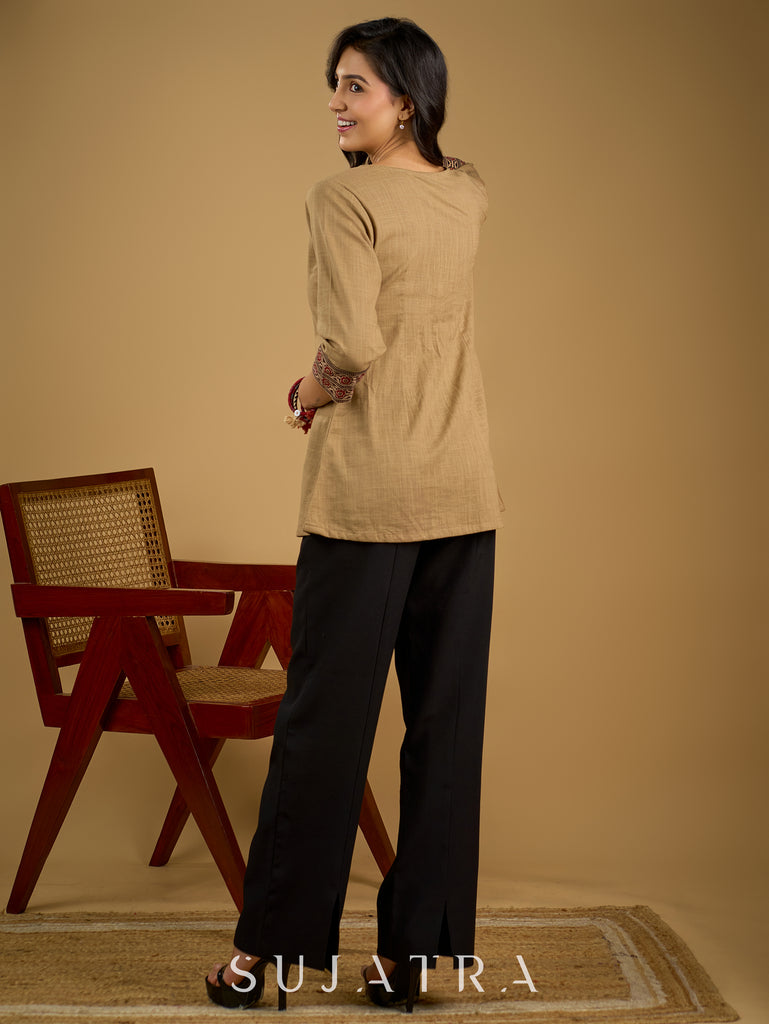 Ethnic dark beige cotton top highlighted with elegant ajrakh detail.