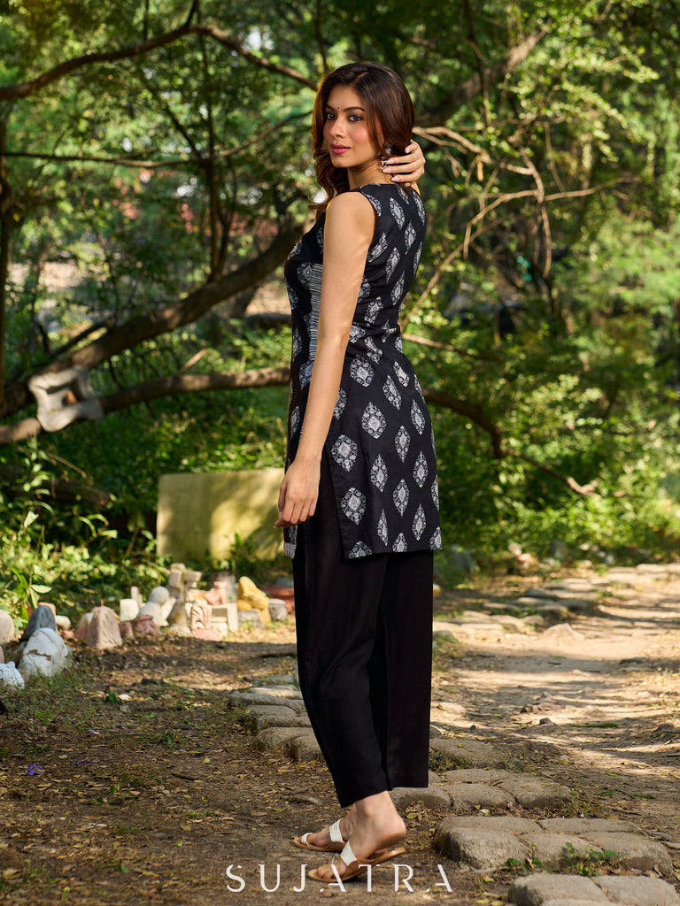 Black viscose sleeveless short kurta elevated with artistic stripe–floral patterns