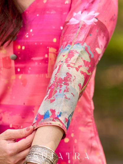 Graceful pink-shaded kurta featuring abstract Pichwai lotus–inspired motifs and a delicate neckline