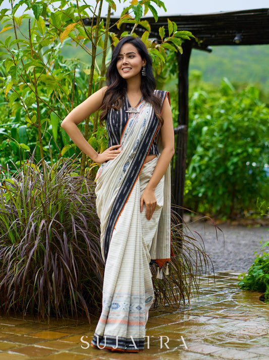 Classic off-white cotton saree with subtle Jamdani-style woven motifs