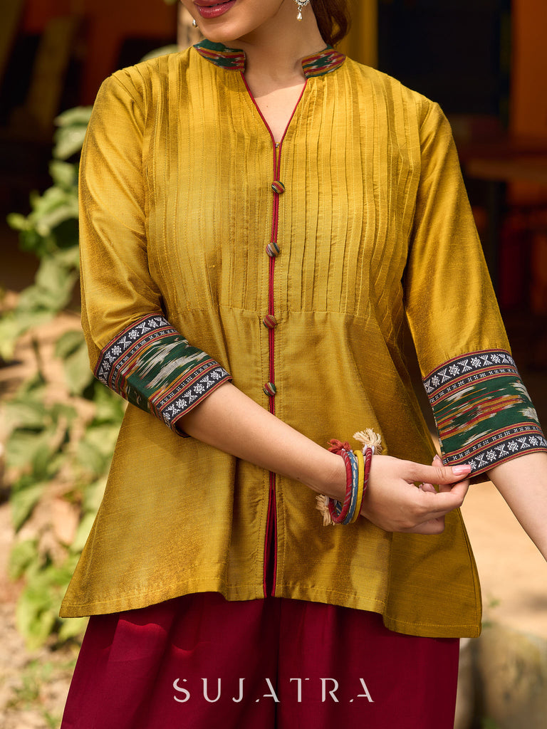Mustard Cotton Silk Top With Pleated Yoke And Contrasting Ikat Detailing On Sleeves And Collar